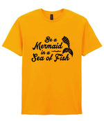 Be a Mermaid in a Sea of Fish t-shirt in gold