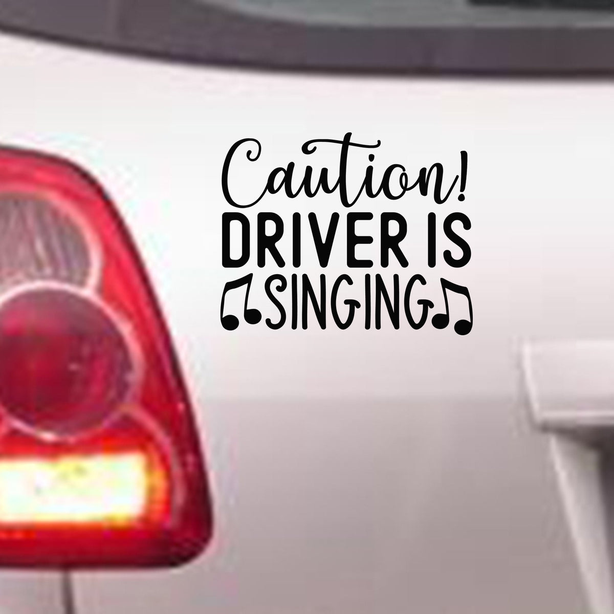 Caution! DRIVER IS SINGING bumper sticker in standard