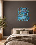 Some Call It Chaos We Call It Family – Wall Sticker in Dark Wall with Light Blue vinyl