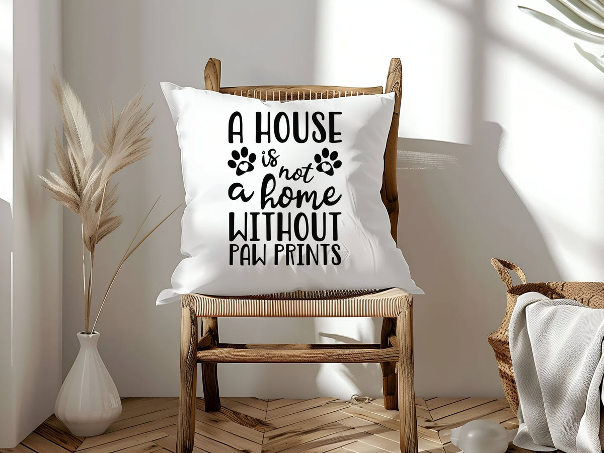 A House Is Not a Home Without Paw Prints cushion in white