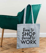 Borntoshopforcedtowork tote bag in light blue