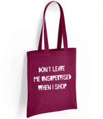 DON'T LEAVE ME UNSUPERVISED WHEN I SHOP tote bag in burgundy