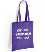 DON'T LEAVE ME UNSUPERVISED WHEN I SHOP tote bag in purple