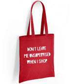 DON'T LEAVE ME UNSUPERVISED WHEN I SHOP tote bag in red