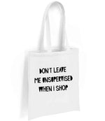 DON'T LEAVE ME UNSUPERVISED WHEN I SHOP tote bag in white