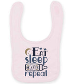 Eat Sleep BE CUTE Repeat toddler bib in pale pink