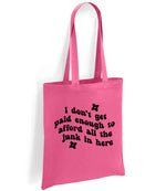 I Don't Get Paid Enough to Afford All the Junk in Here tote bag in fuchsia
