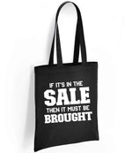 If It's in the Sale Then It Must Be Brought tote bag in black