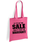 If It's in the Sale Then It Must Be Brought tote bag in fuchsia