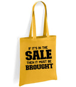 If It's in the Sale Then It Must Be Brought tote bag in mustard