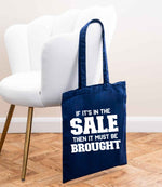 If It's in the Sale Then It Must Be Brought tote bag in navy