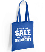 If It's in the Sale Then It Must Be Brought tote bag in royal blue