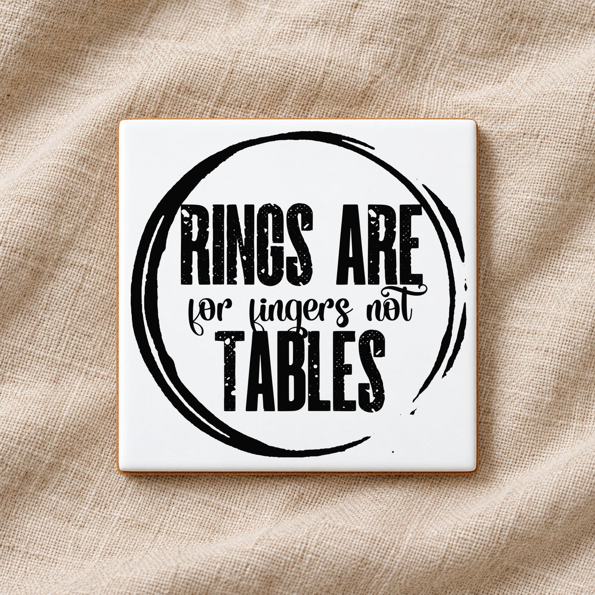RINGS ARE for Fingers Not TABLES ceramic coaster in white