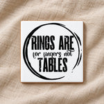 RINGS ARE for Fingers Not TABLES ceramic coaster in white