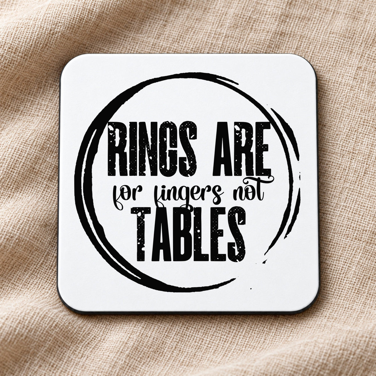 RINGS ARE for Fingers Not TABLES coaster in white