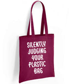 Silently Judging Your Plastic Bag tote bag in burgundy