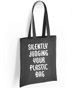 Silently Judging Your Plastic Bag tote bag in charcoal
