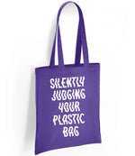 Silently Judging Your Plastic Bag tote bag in purple