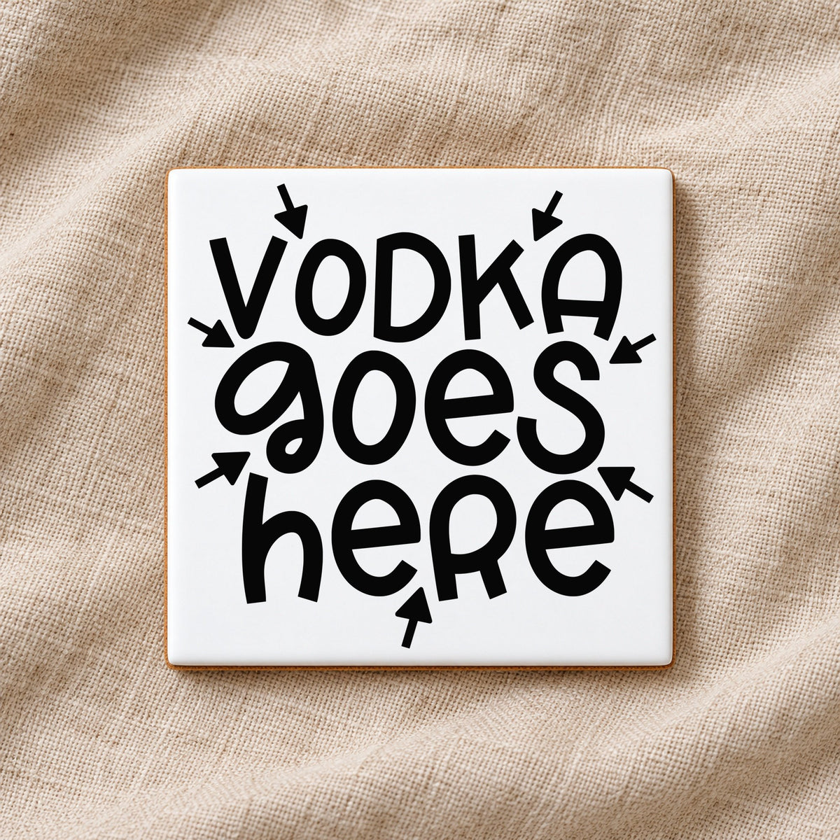 Vodka Goes Here ceramic coaster in white