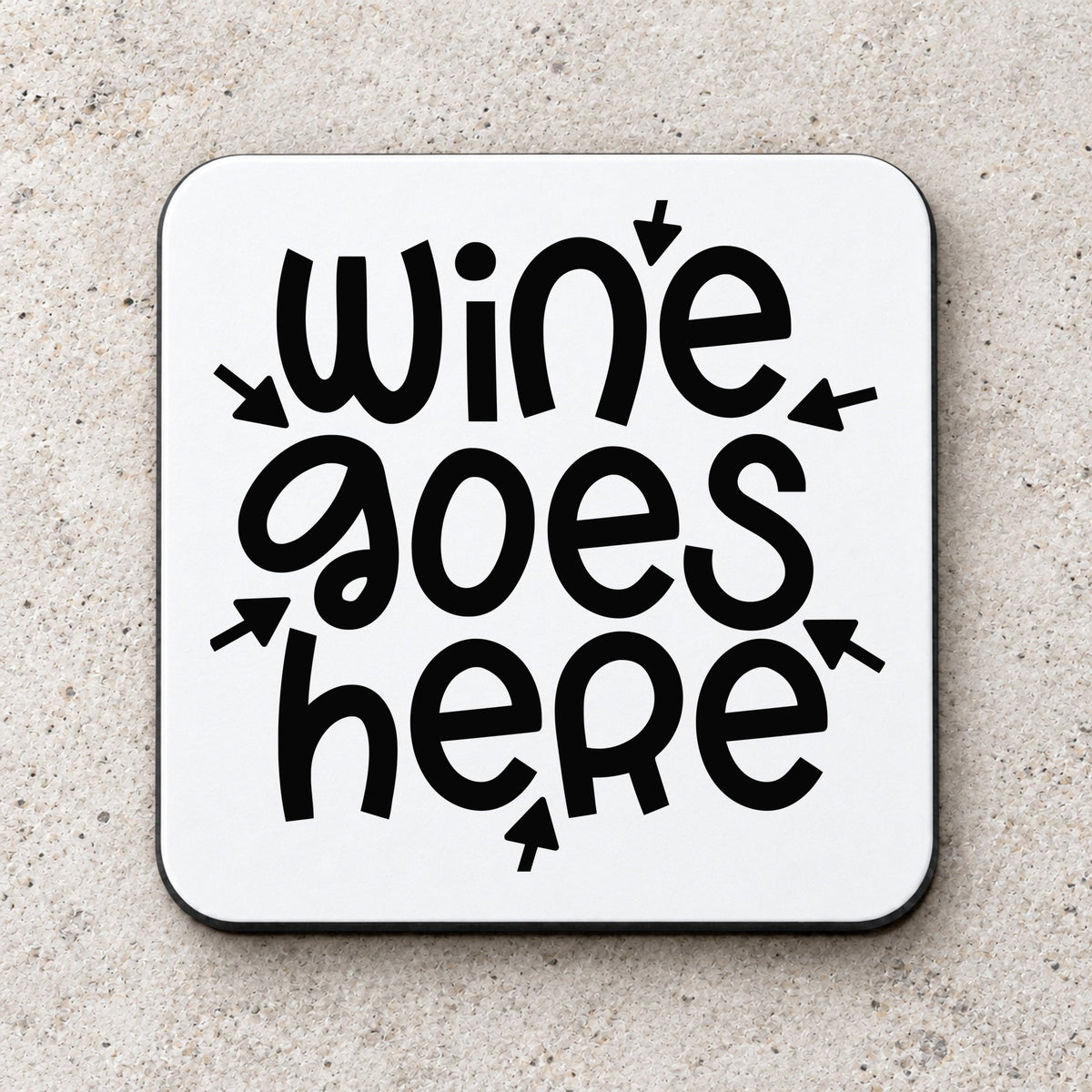 Wine Goes Here coaster in white