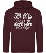 You Don't Have to Be Crazy to Work Here but It Helps! hoodie in burgundy