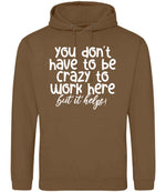 You Don't Have to Be Crazy to Work Here but It Helps! hoodie in caramel toffee